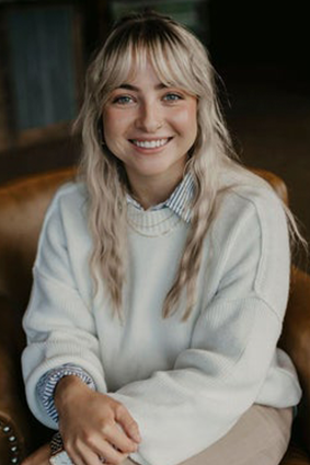 Portrait of Shelby Burgstaler, Owner + Guest Relations.